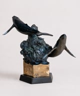 Majestic bronze humpback whale sculpture, rear view