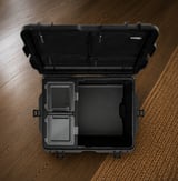 Top view of the Treasure Chest interior with fitted compartments and lid pockets