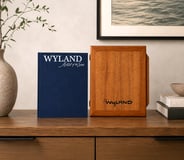 Wyland Artist of the Sea book beside its engraved wooden presentation box